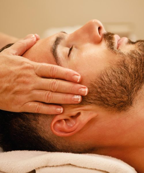 closeup-man-getting-head-massage-relaxing-with-eyes-closed-spa